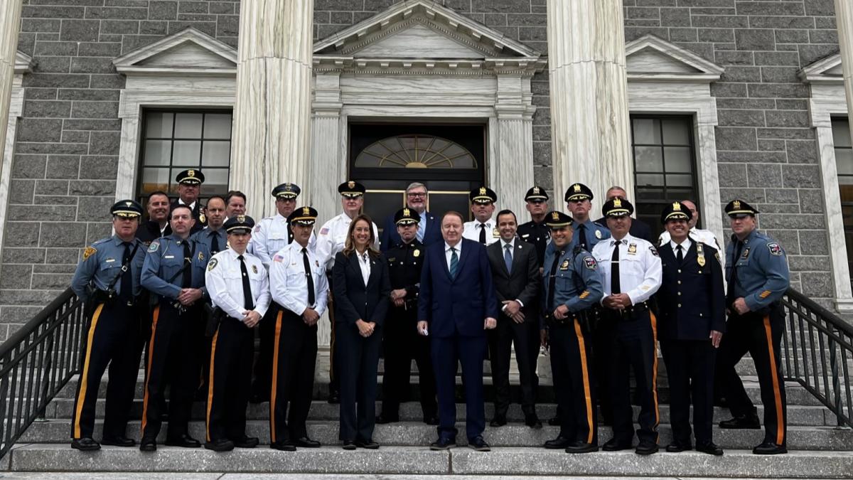 Rep. Sherrill with police