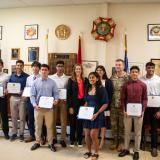 Rep. Sherrill standing alongside the 2025 appointees