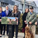 Rep. Sherrill speaks at a press conference with Vietnam Veteran Walter Parker and his service dog, Jackson, at the Capitol last year