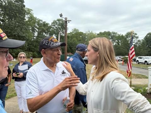 Rep. Sherrill speaking to a fellow veteran