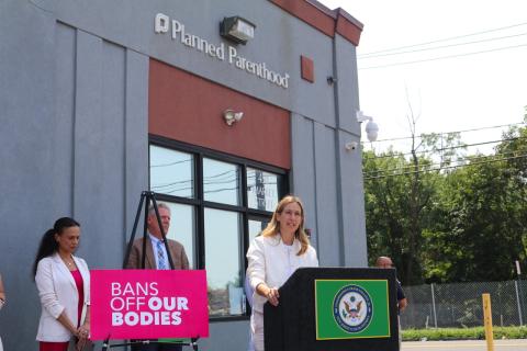 Rep. Sherrill speaking at a press conference in front of the Perth Amboy Planned Parenthood