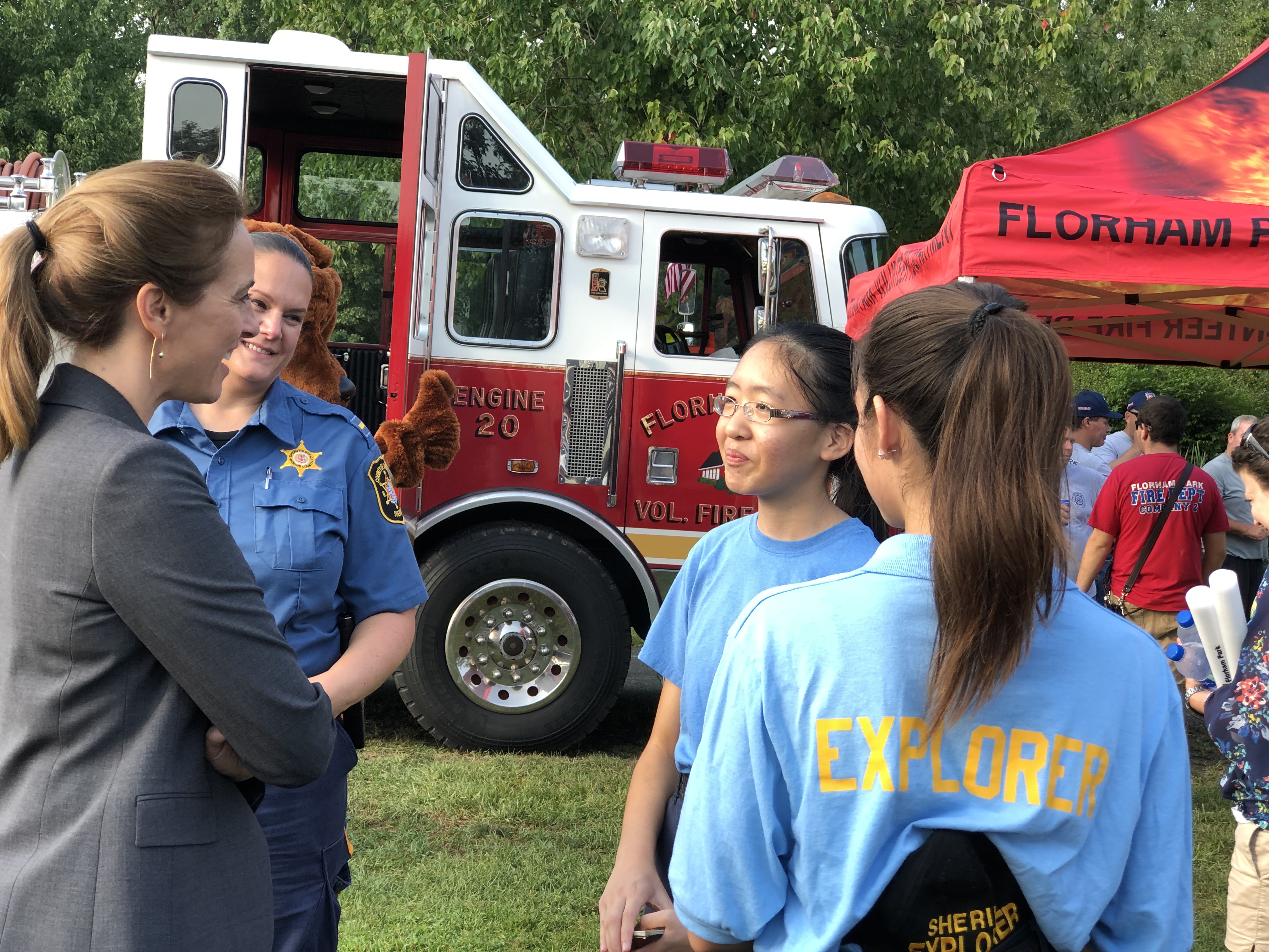 Rep. Sherrill learns about the Sherriff's Explorers Program at Florham Park NNO
